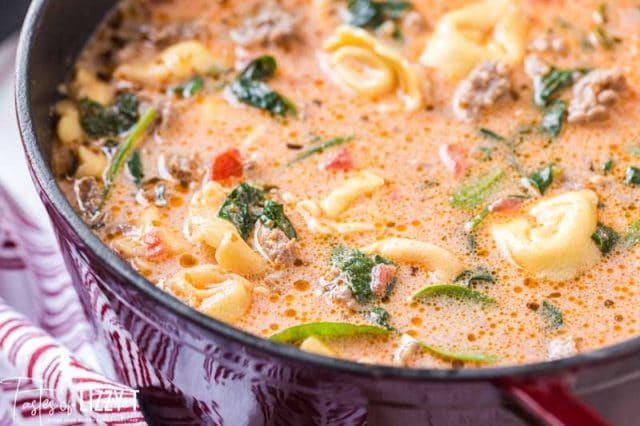 creamy tortellini soup in a dutch oven