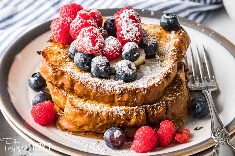 plate of french toast with berries