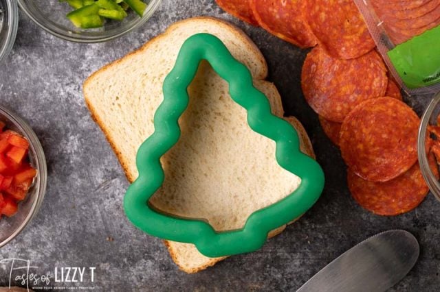 christmas tree cutout on a slice of bread