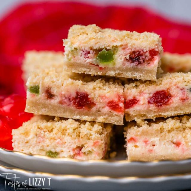 stack of christmas cheesecake bars on a plate