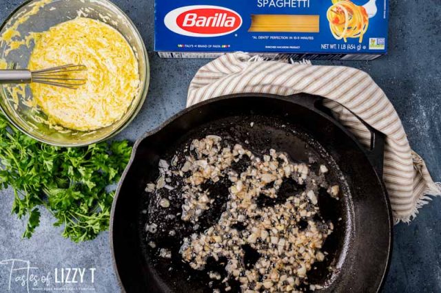 sauteed onions in a cast iron skillet