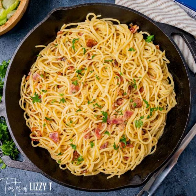 overhead view of pasta carbonara in a cast iron skillet