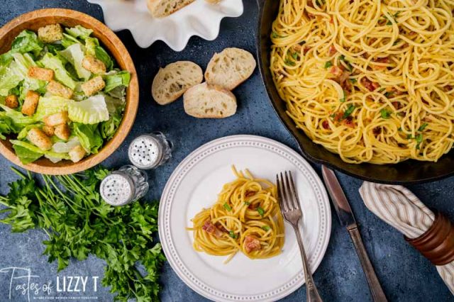 overhead shot of a pasta dinner on a table