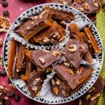 overhead view of homemade toffee in a gift tin