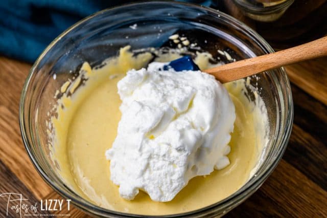 egg whites folding into cake batter