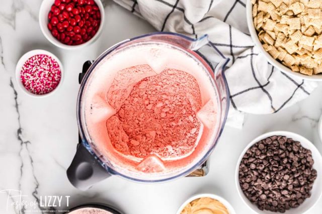 pink powdered sugar in a mixing bowl