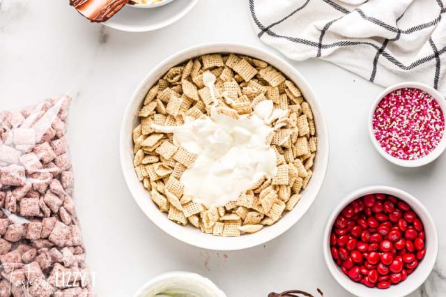 white chocolate over rice chex in a bowl