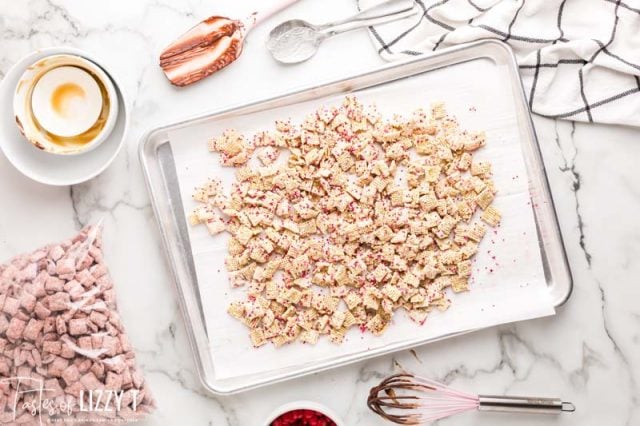 rice chex with white chocolate on a baking sheet