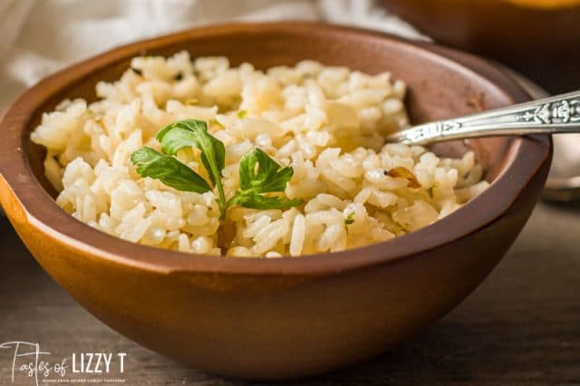 white rice in a bowl with a spoon