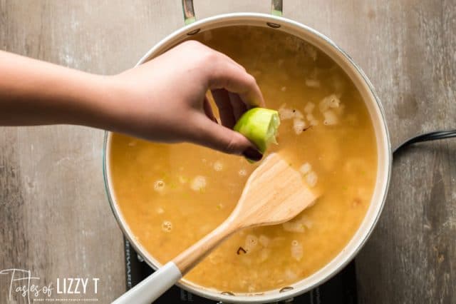 lime juice in simmering rice