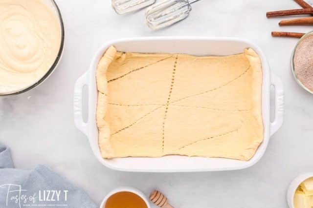 unbaked crescent rolls in a baking pan