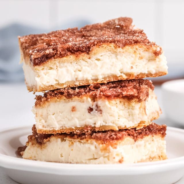 stack of three sopapilla cheesecake bars