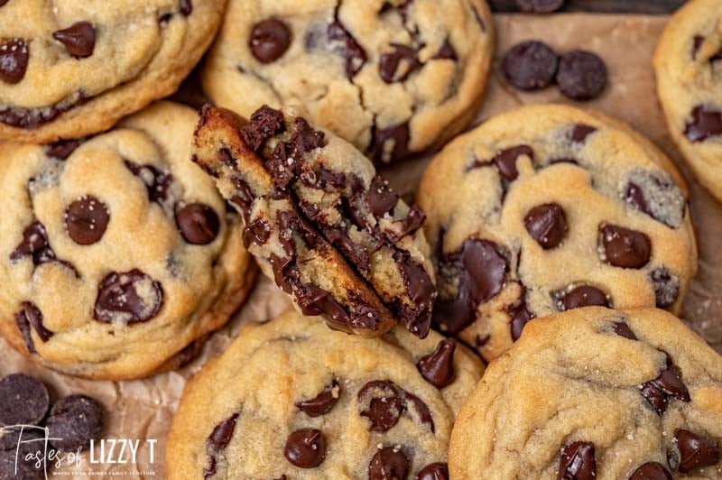 closeup of chocolate chip cookies with one broken in half