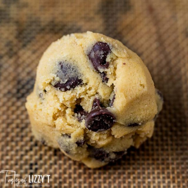cookie dough ball on a baking mat