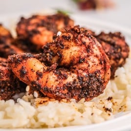 plate with blackened shrimp and rice