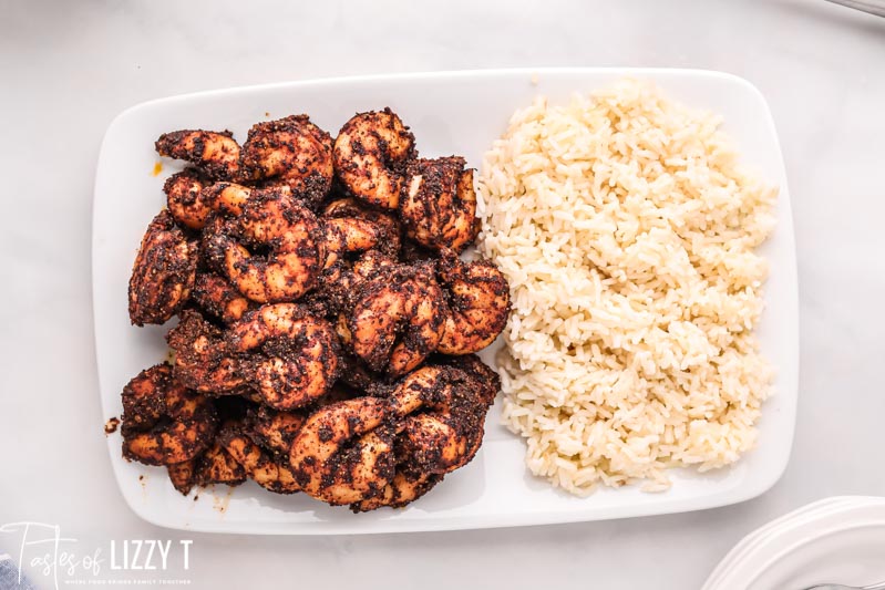 overhead view of a plate of shrimp and rice