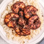 overhead of a plate of smoked shrimp and rice