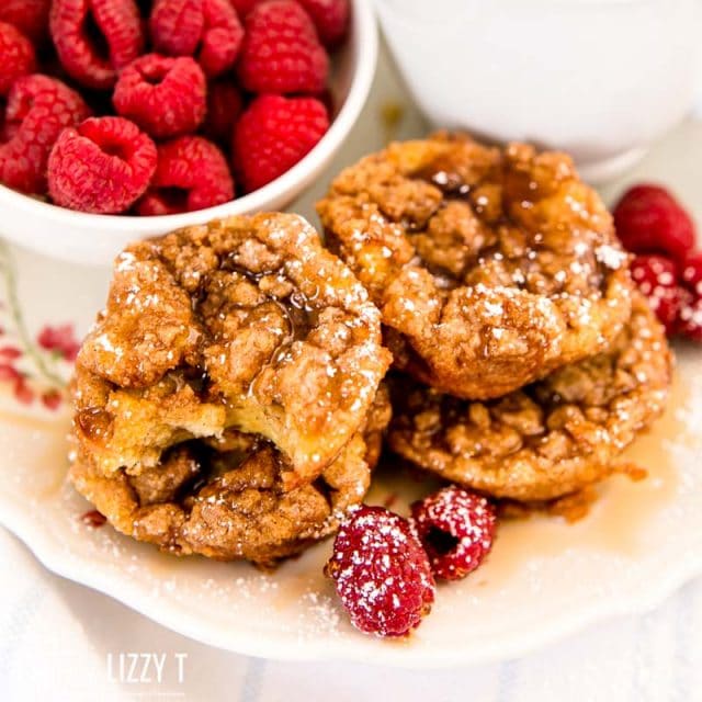 stack of french toast muffins with raspberries