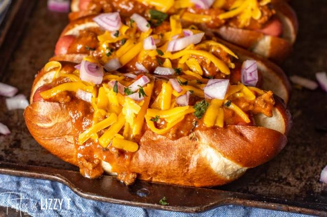 closeup of a chili dog on a baking sheet