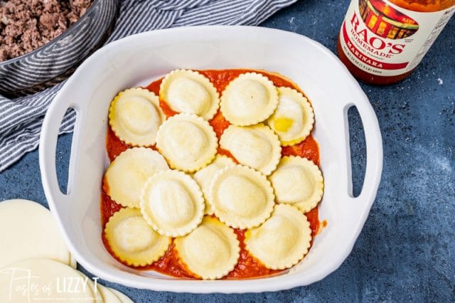 frozen ravioli in a baking pan