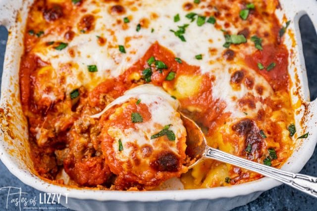 lasagna bake in a pan with a spoon