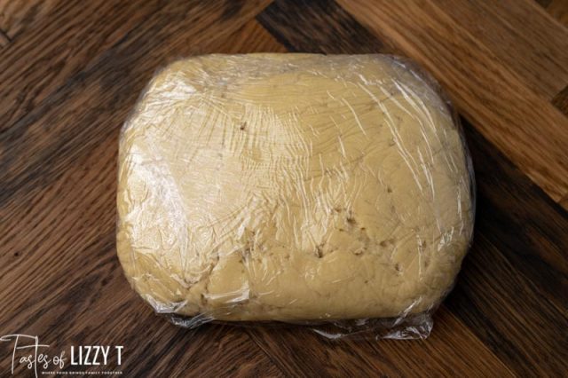 sugar cookie dough wrapped in plastic wrap