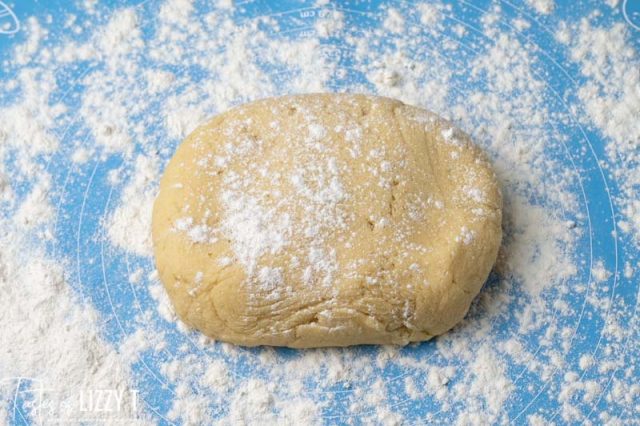 sugar cookie dough on a floured mat
