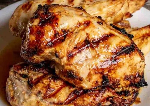 pile of grilled chicken on a plate