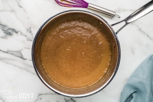 a saucepan with caramel in it
