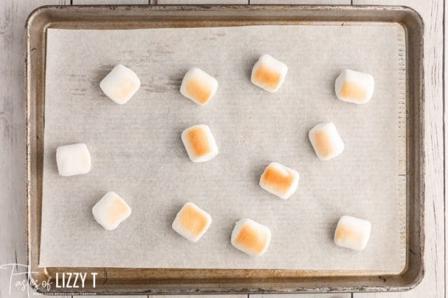 light brown marshmallows on a baking sheet