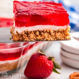 a slice of strawberry pretzel dessert on a spatula