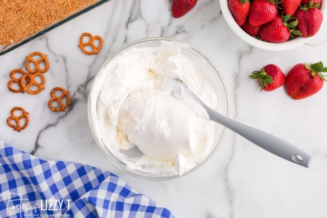 whipped cream cheese mixture in a mxiing bowl
