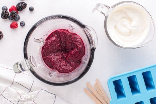 blended berries in a glass jar