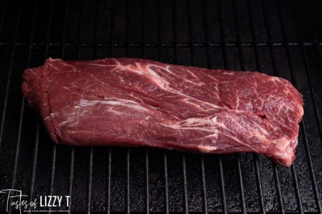 flat iron steak on a grill
