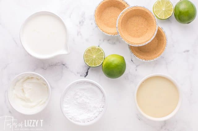 ingredients for key lime pie on a table