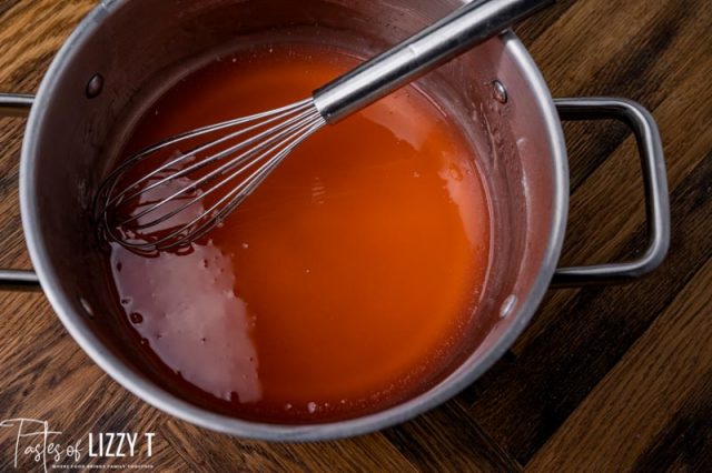 peach jello in a saucepan