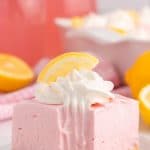 a pink lemonade icebox pie square on a plate