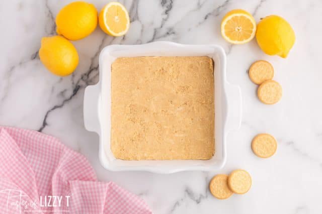 golden oreo crust in a baking pan