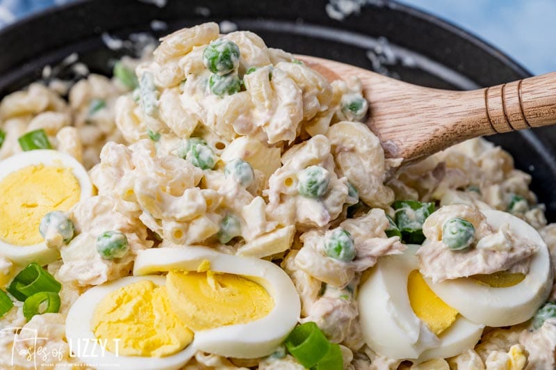 macaroni salad in a pan with spoon