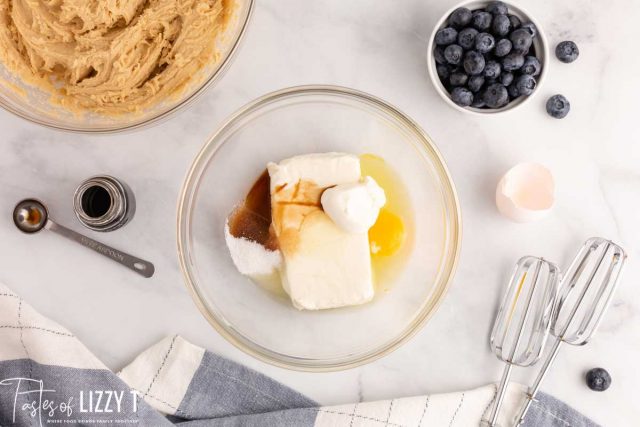 cream cheese, egg adn sugar in a bowl