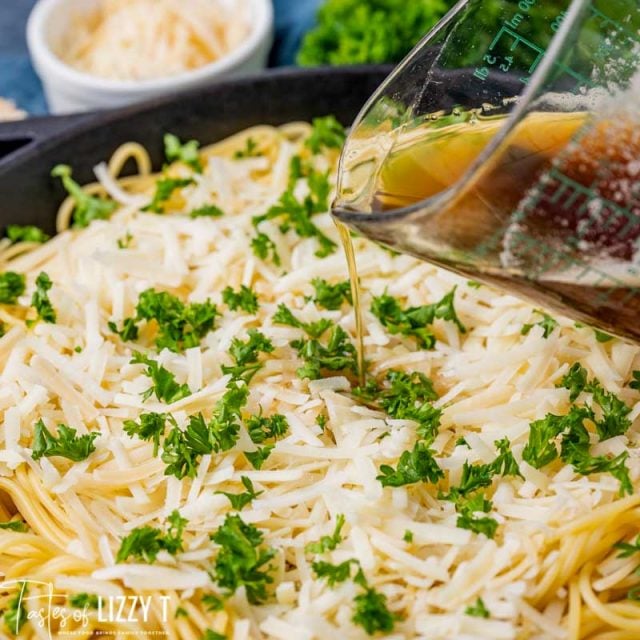 brown butter pouring over spaghetti