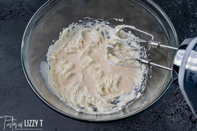 milk and cream cheese in a mixing bowl