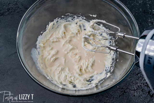 milk and cream cheese in a mixing bowl