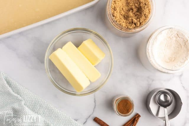 butter and sugars in bowls on a table
