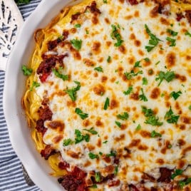 baked spaghetti pie with cheese and parsley