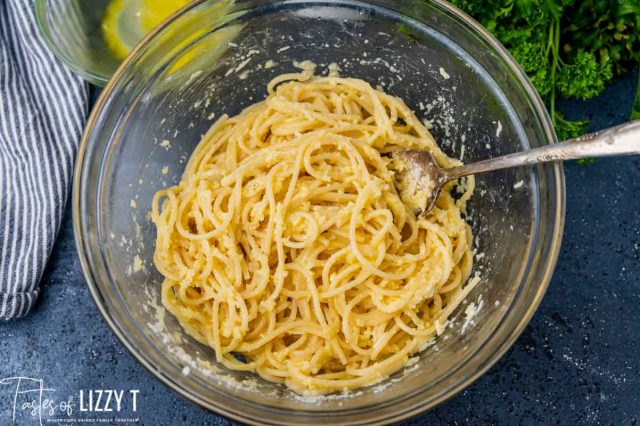 spaghetti mixed with parmesan cheese and egg