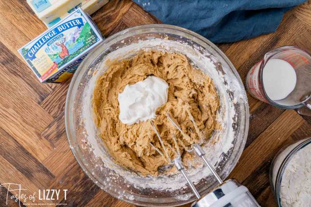 mixing sour cream into cake batter