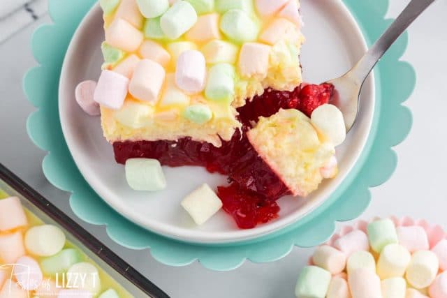 closeup of a piece of cherry jello salad on a plate