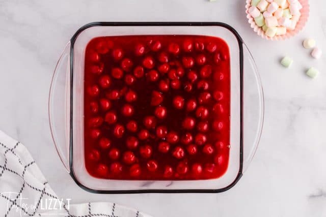 cherries and jello in a bowl