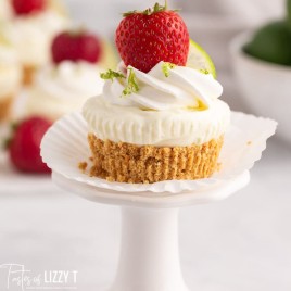 a mini lime cheesecake on a cupcake stand